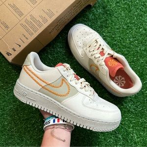 Nike Cream and Orange Sneakers